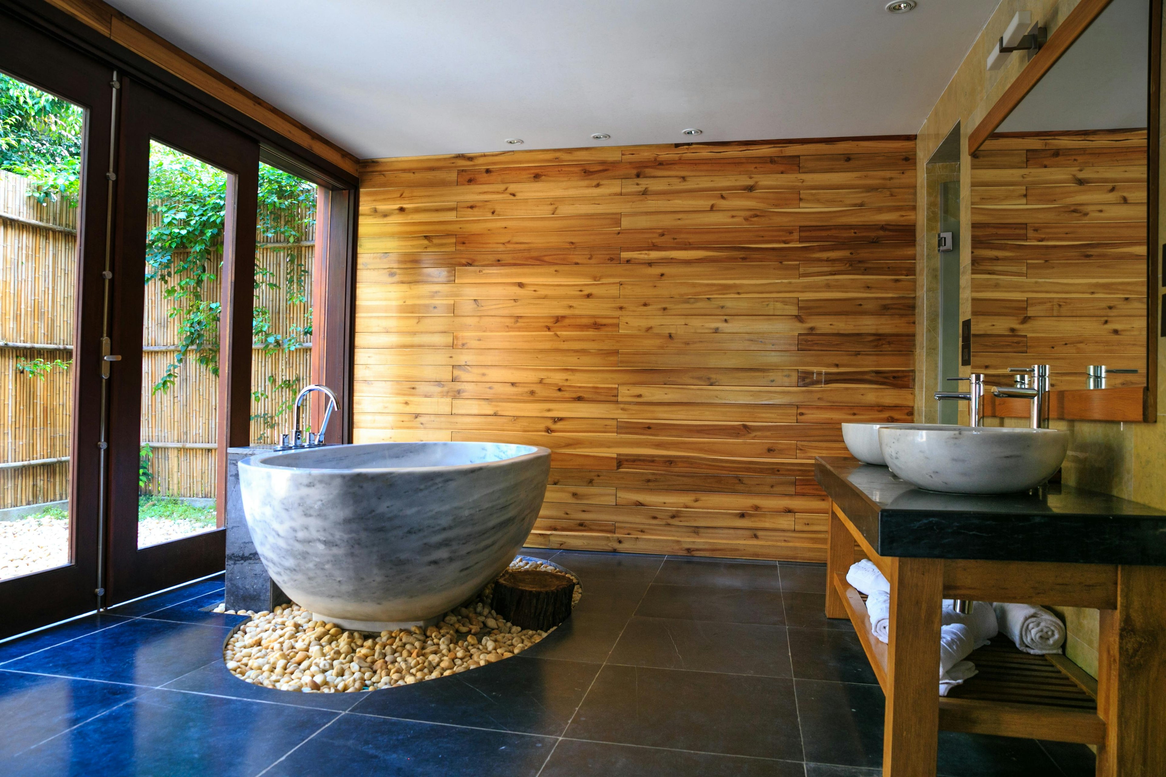 Bespoke wood finish bathroom by Timeless Bathrooms in Cardiff – custom carpentry and natural tones for a warm, modern design.
