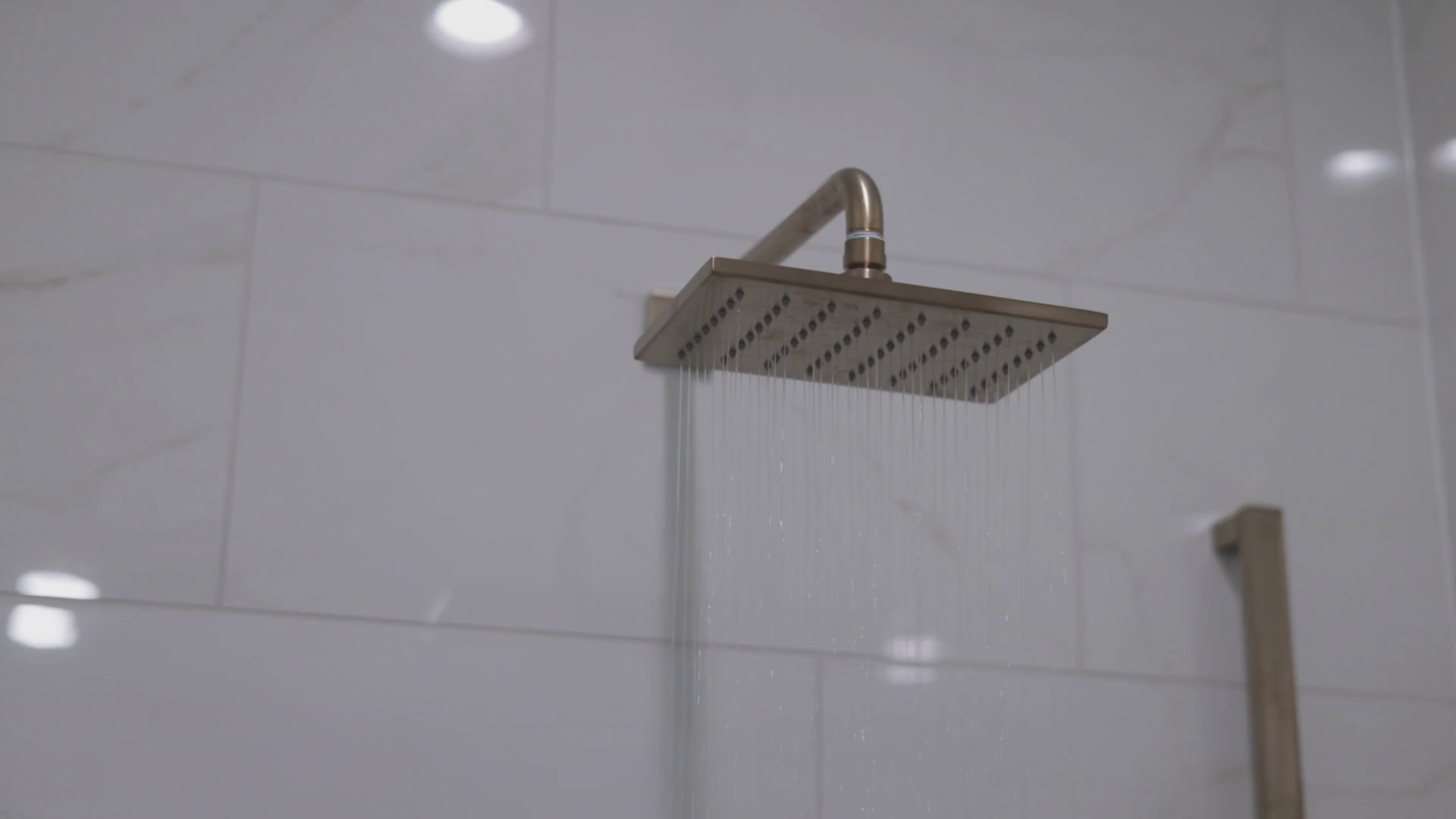 Modern shower in action with water running, installed by Timeless Bathrooms in Cardiff – sleek design and expert bathroom fitting